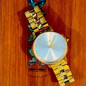 Nixon gold women’s watch